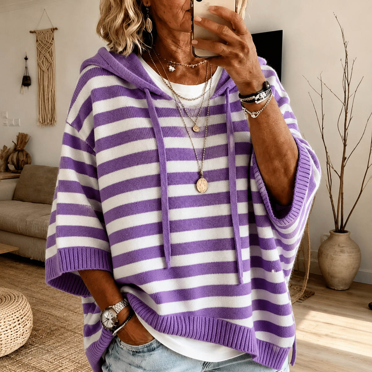 Fien: paars gestreepte ponchotrui met capuchon