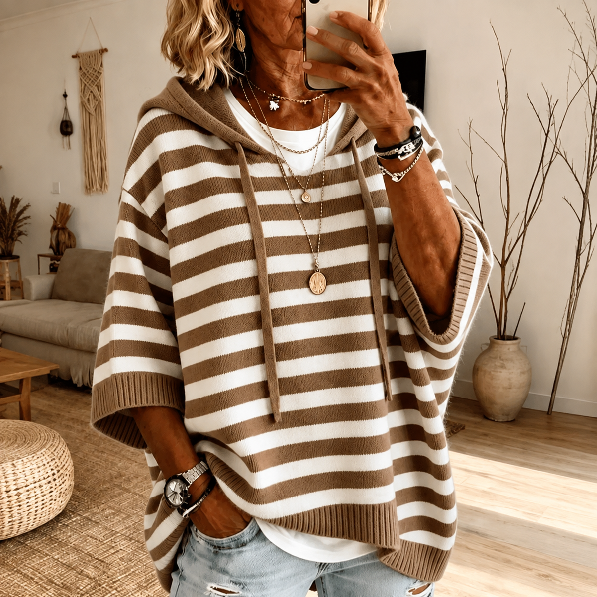 Sofie: gestreepte ponchotrui met capuchon